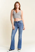 Women's blue bootcut jeans, perfect for pairing with boots