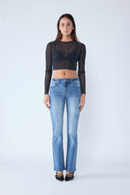 Women's bootcut jeans, light blue denim, perfect for wearing with boots