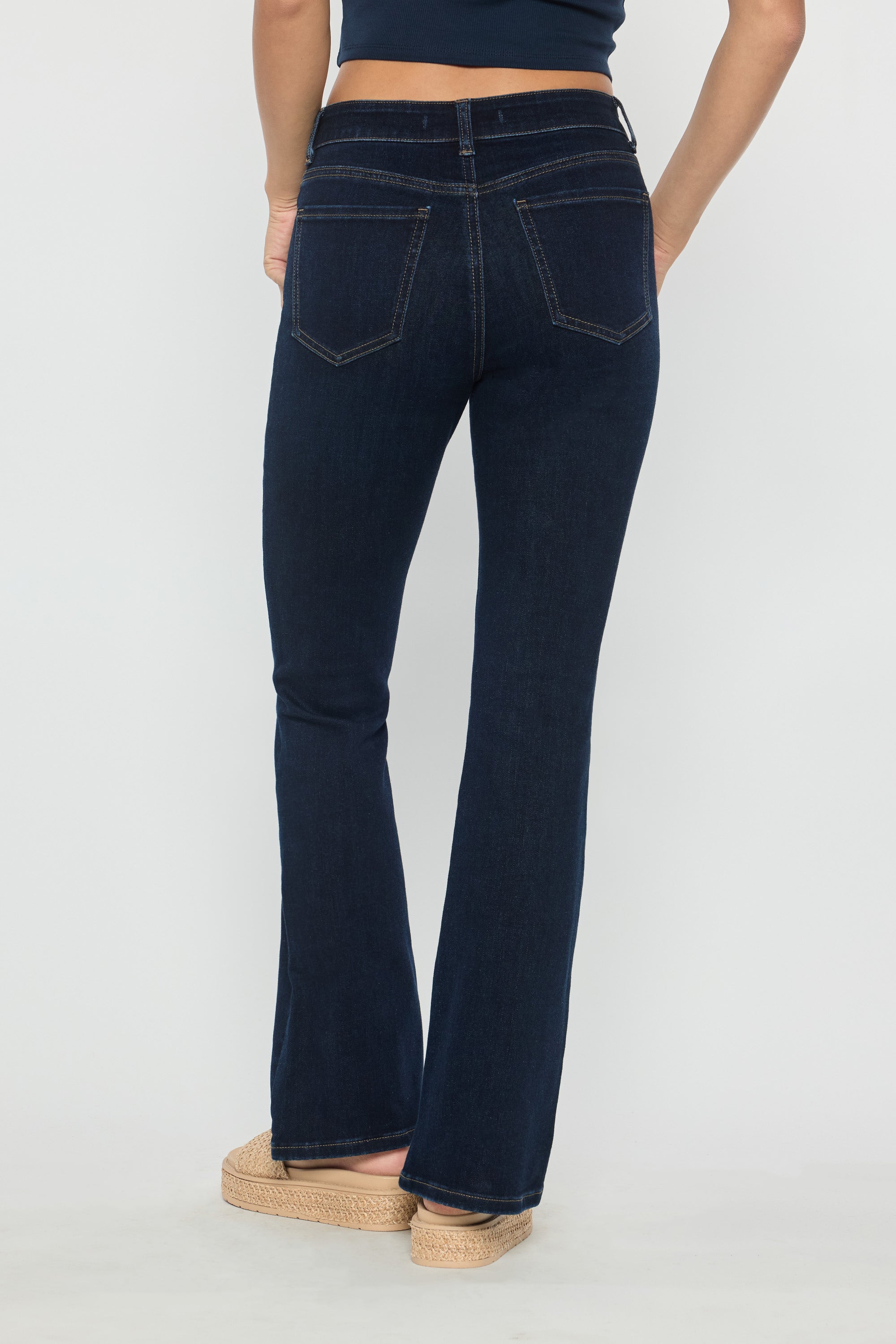 Women's dark blue bootcut jeans, perfect for pairing with boots