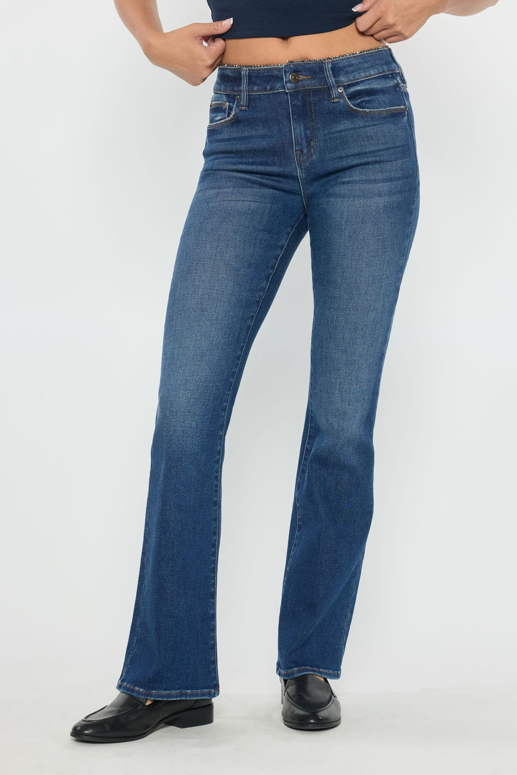 Women's dark blue bootcut jeans, perfect for pairing with boots