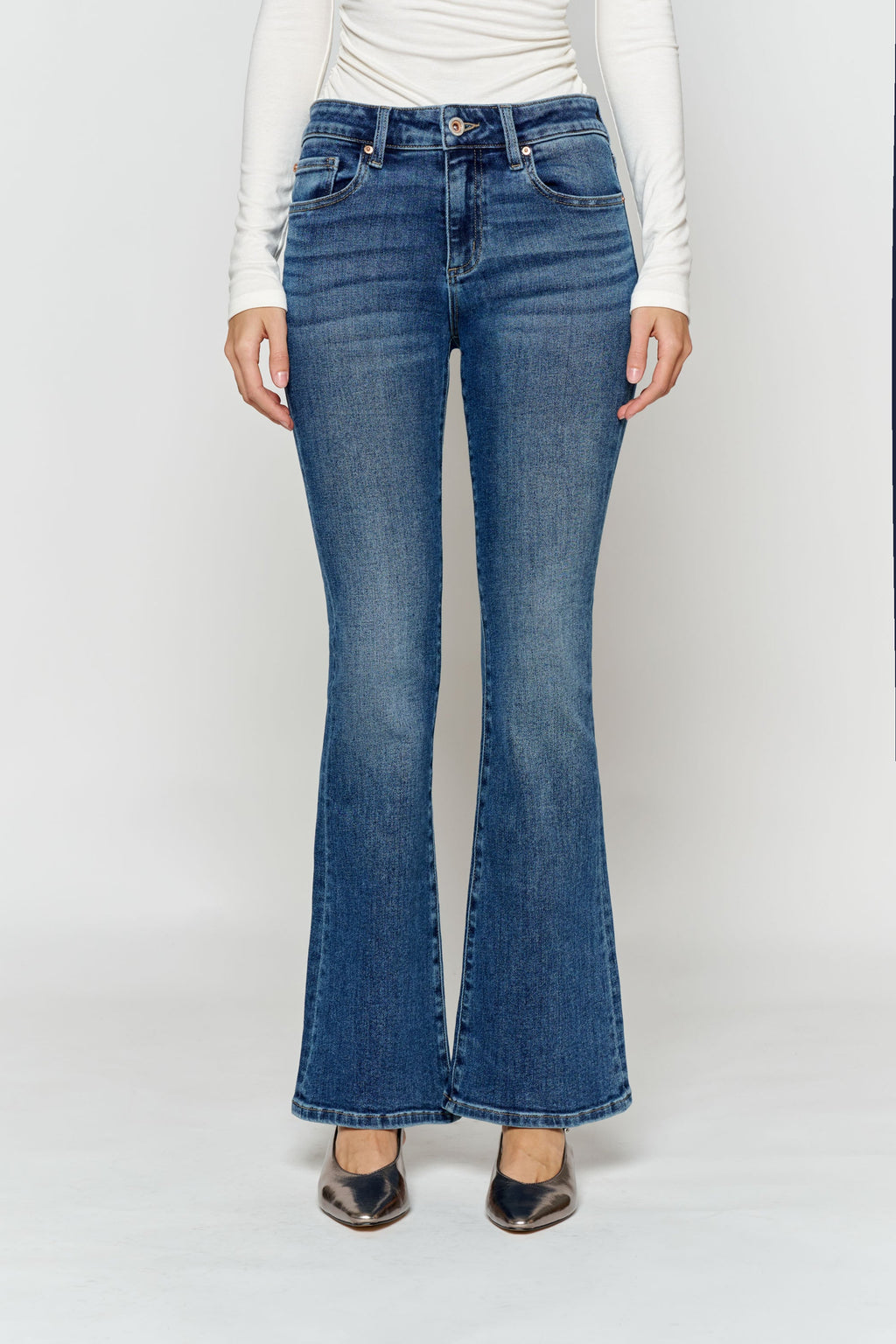 Women's bootcut jeans in dark blue denim, perfect for wearing with boots