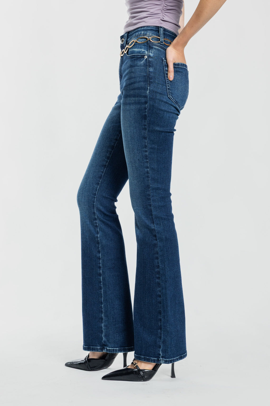 Women's bootcut jeans in dark wash, perfect for pairing with boots