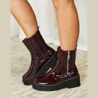 Trendsi women's burgundy platform boots with shiny patent finish