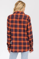 Back view of Women's Boyfriend Style Checkered Flannel Shirt in orange and navy colors
