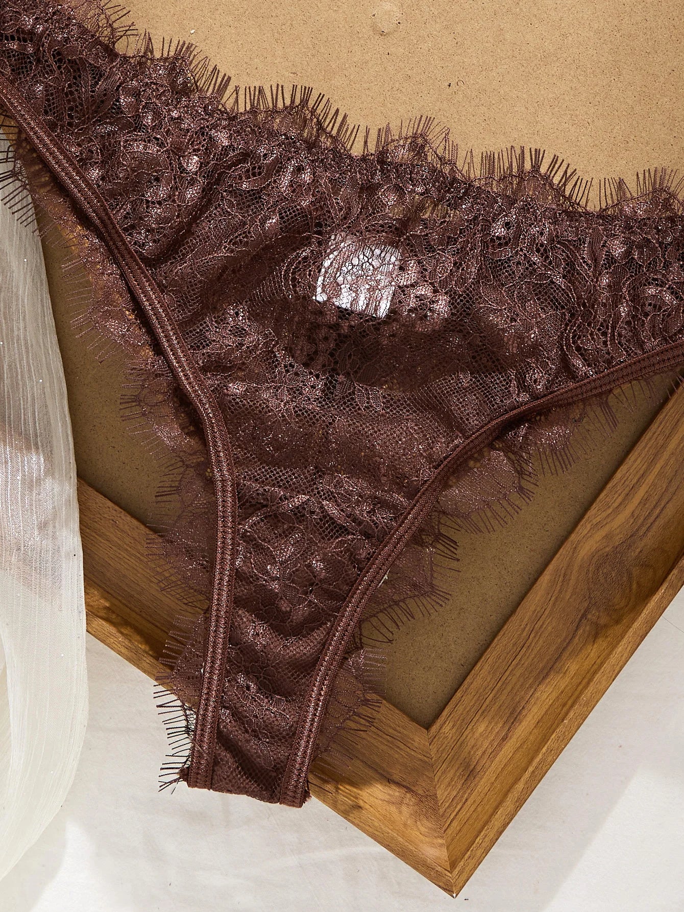 Brown lace bra with delicate trim for comfort and style