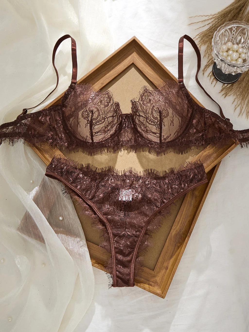 Brown lace bra with matching panties for elegant comfort