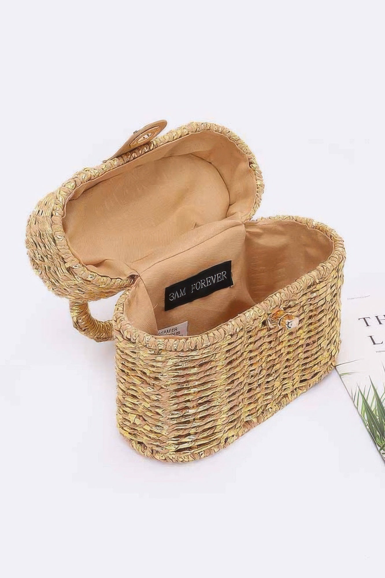 Braided cotton top handle bag with an open interior showcasing a spacious design for essentials