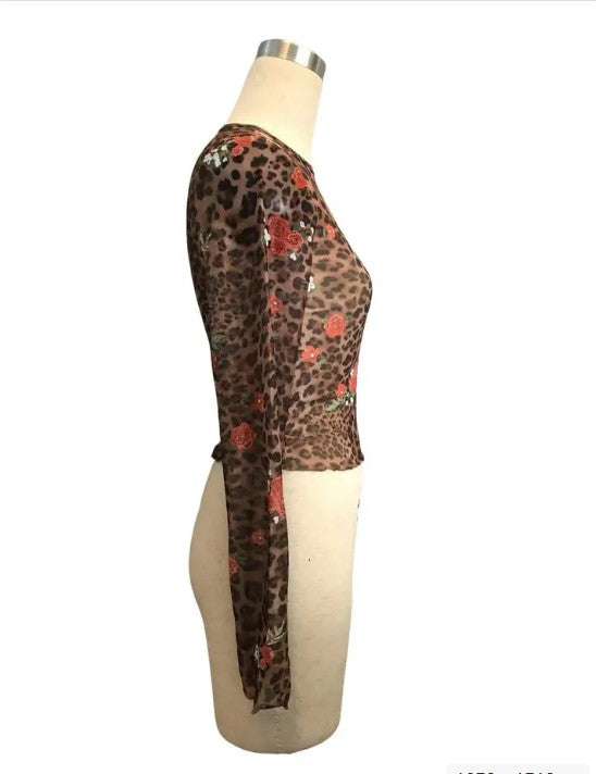 Side view on mannequin of Miss Sparkling cropped mesh floral leopard top sheer long sleeves
