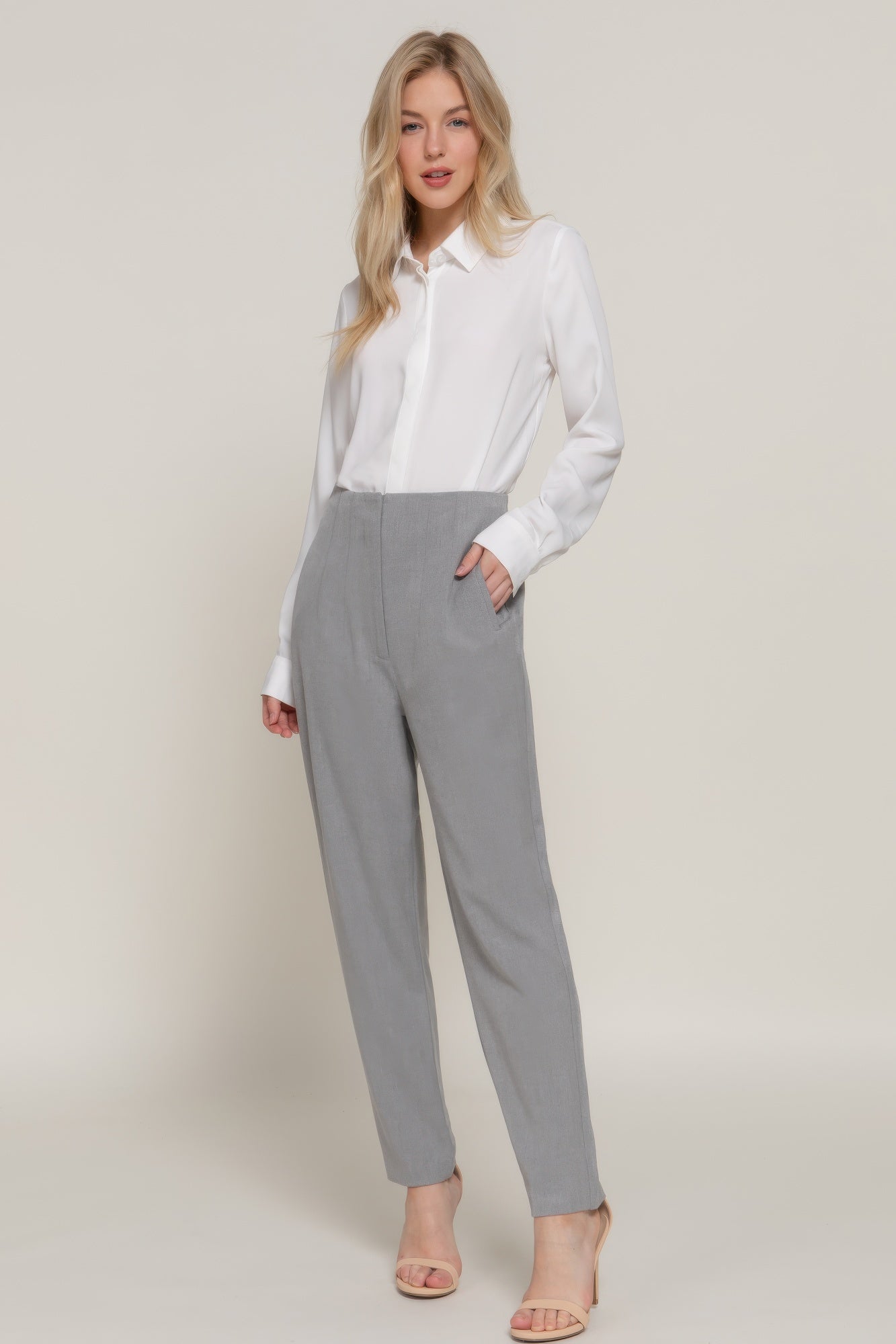 VacationGrabs women's stylish high rise trousers in gray paired with a white blouse and heels