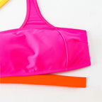 Women's bright beachwear in pink and orange for sunny days