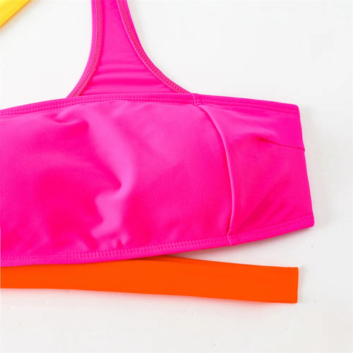 Women's bright beachwear in pink and orange for sunny days