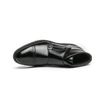 British luxury ankle boots in sleek black leather with stylish buckle detail and a polished finish