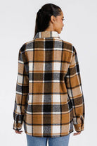 Back view of WEIV brown boyfriend flannel shacket with large plaid pattern and button details