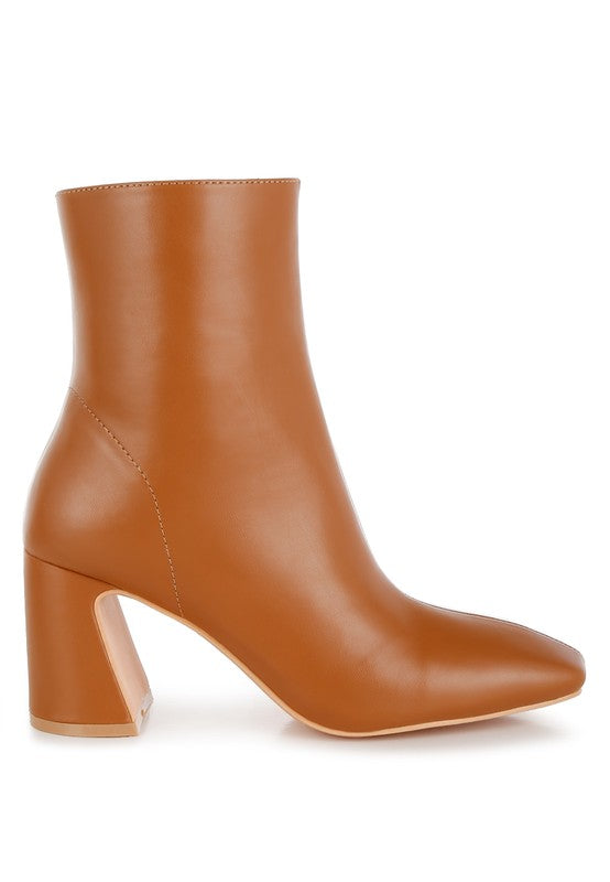 Brown leather ankle boots for women with a stylish block heel and sleek design
