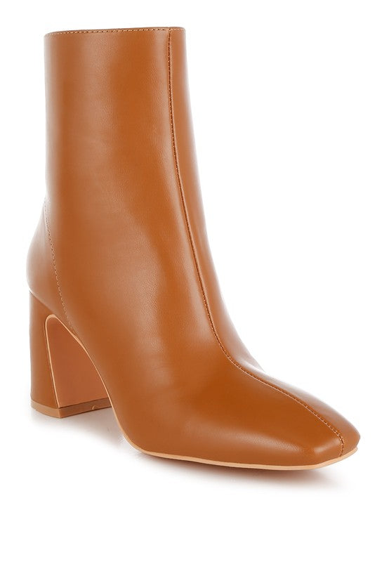 Stylish brown leather ankle boots for women with a chic high heel design