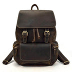Brown leather laptop backpack with multiple pockets and adjustable straps for everyday use