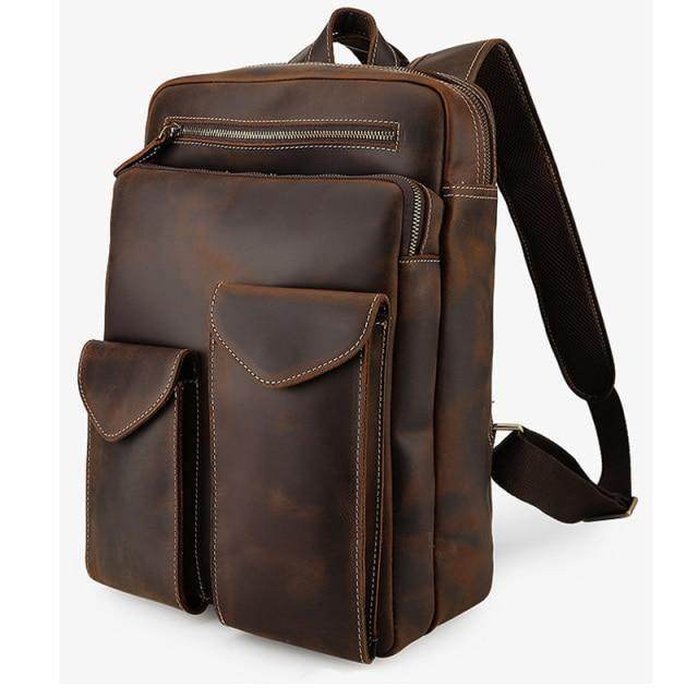 Brown leather laptop backpack with multiple pockets for organization and comfortable straps
