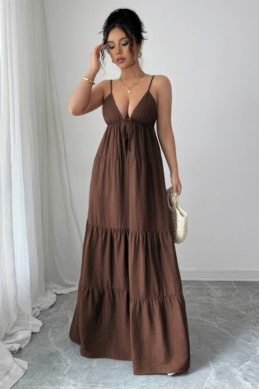 Brown tiered maxi dress with adjustable straps for casual outings