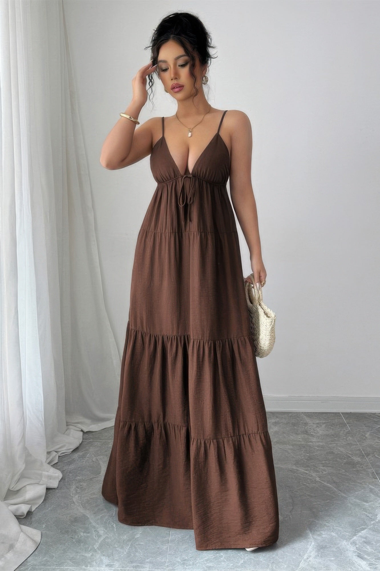 Brown tiered maxi dress with adjustable straps for casual outings