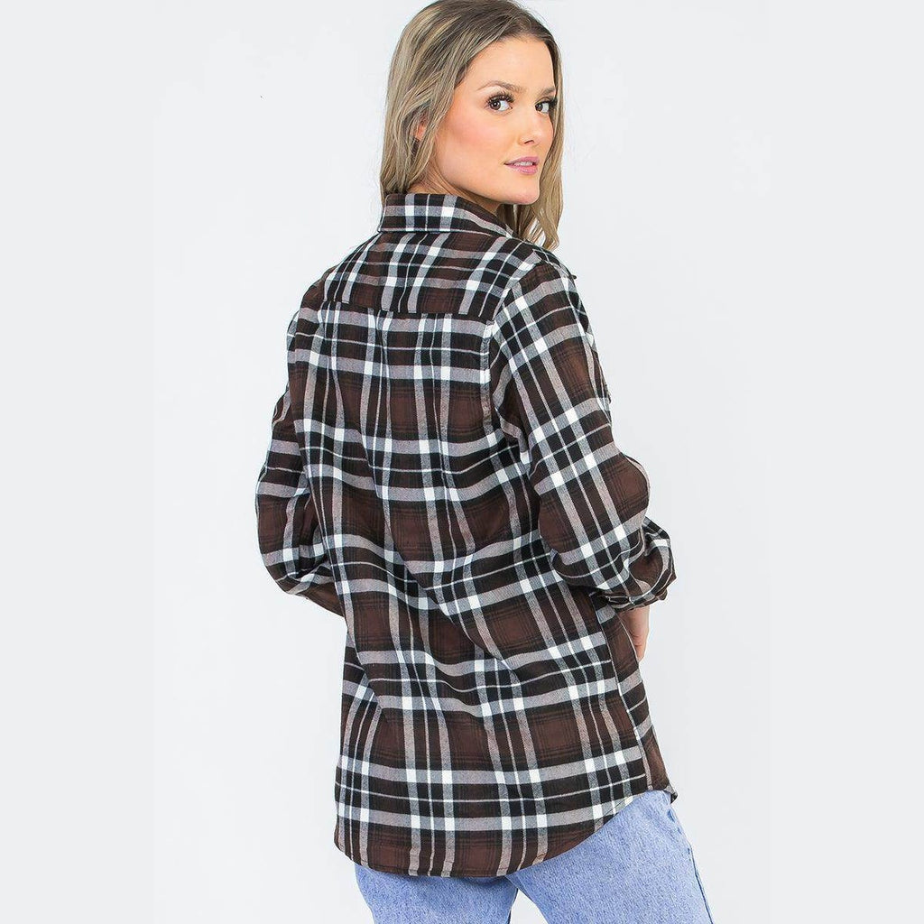Stylish women's brown plaid checkered flannel shirt with long sleeves and a relaxed fit