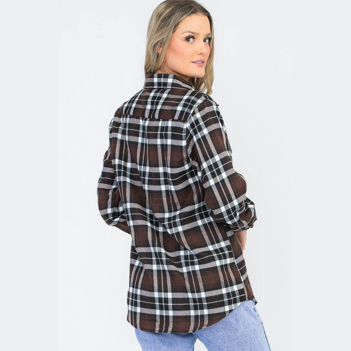 Stylish women's brown plaid checkered flannel shirt with long sleeves and a relaxed fit