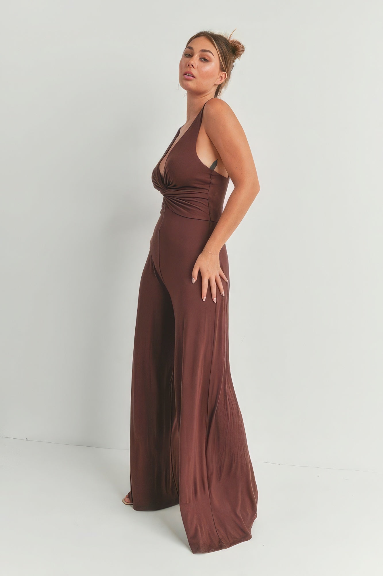 Stylish brown wide leg romper from VacationGrabs with halter neck and flattering fit
