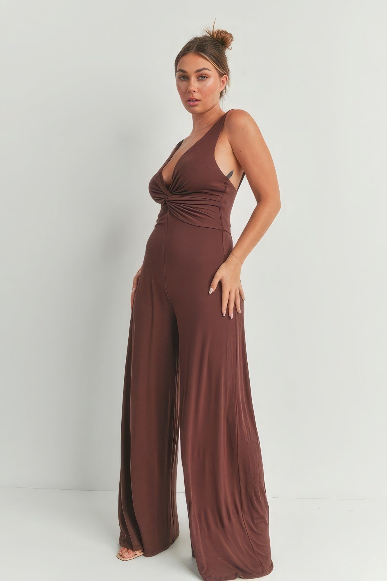 Brown wide leg romper from VacationGrabs with a flattering twist front design and relaxed fit