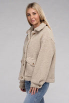 Ambiance Apparel Button-Front Sherpa Coat in beige with side pockets for cozy warmth