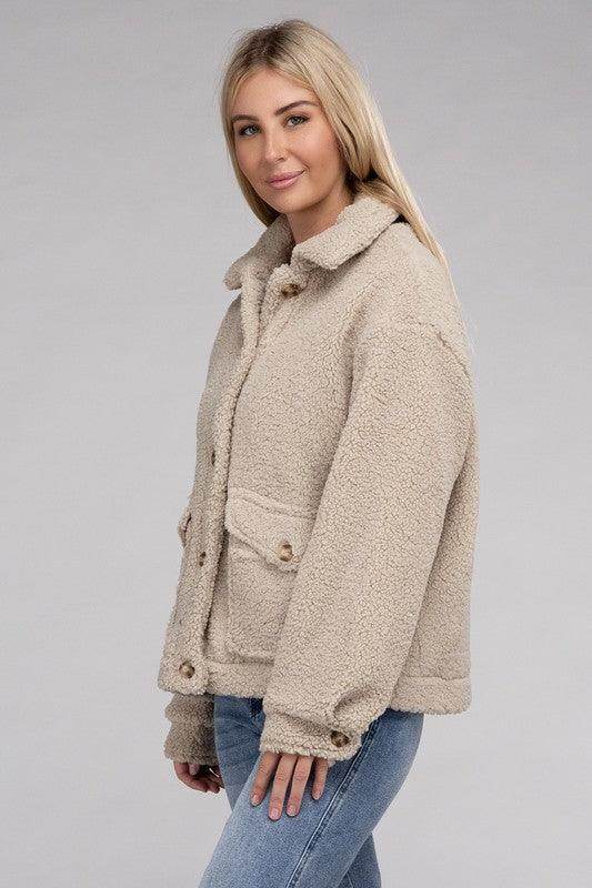 Ambiance Apparel Button-Front Sherpa Coat in beige with side pockets for cozy warmth