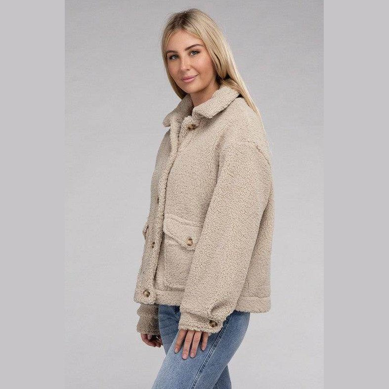 Ambiance Apparel Button-Front Sherpa Coat in beige with side pockets for cozy warmth