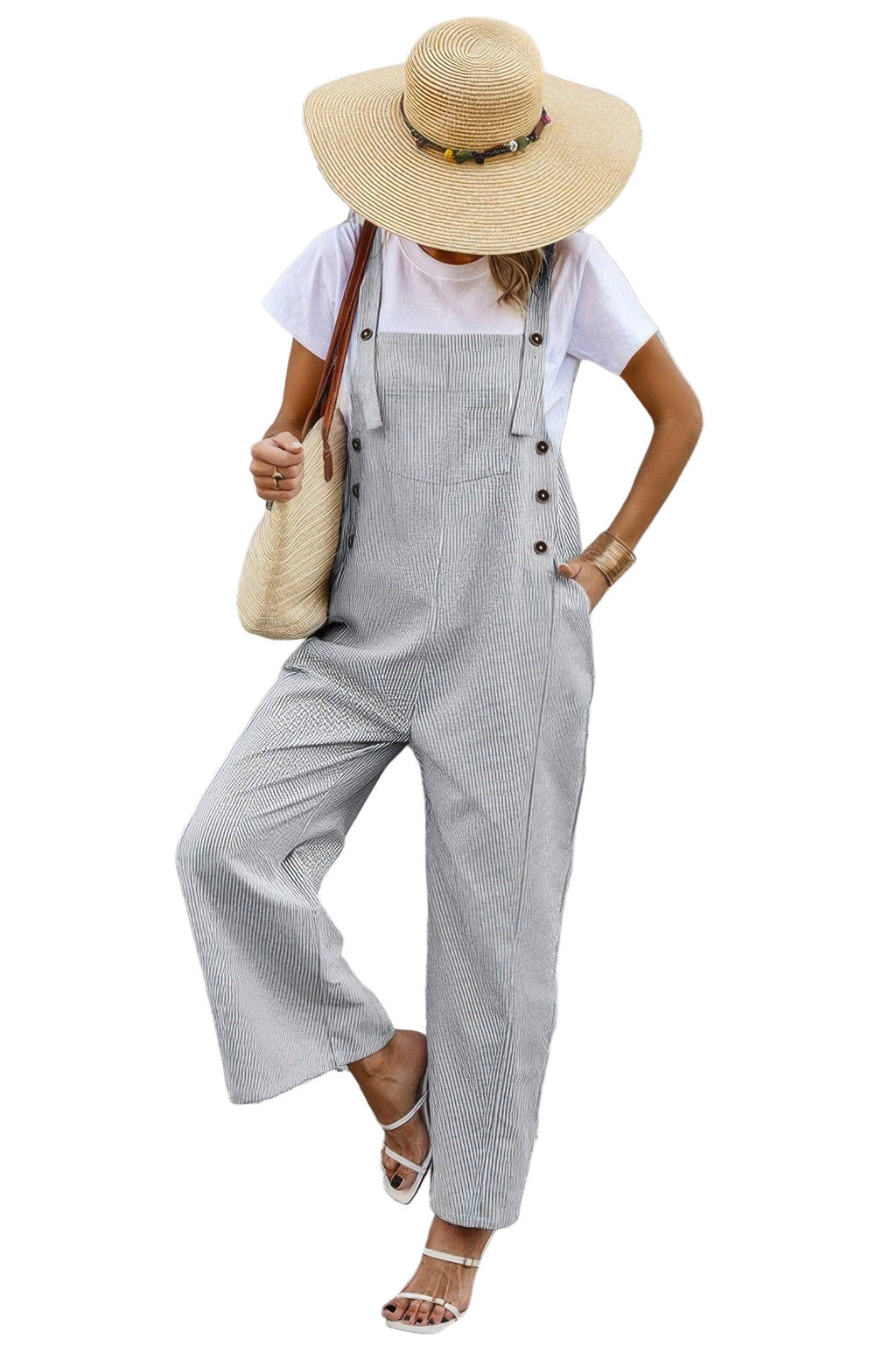Stylish women's button trim casual jumpsuit in gray with wide legs and oversized hat for summer outings