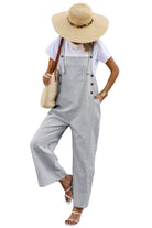 Stylish women's button trim casual jumpsuit in gray with wide legs and oversized hat for summer outings