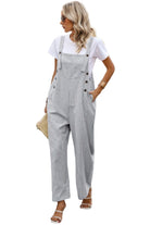 Stylish women's button trim casual jumpsuit with a relaxed fit and side pockets, paired with a white t-shirt