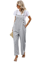 Stylish women's button trim casual jumpsuit with a relaxed fit and side pockets, paired with a white t-shirt