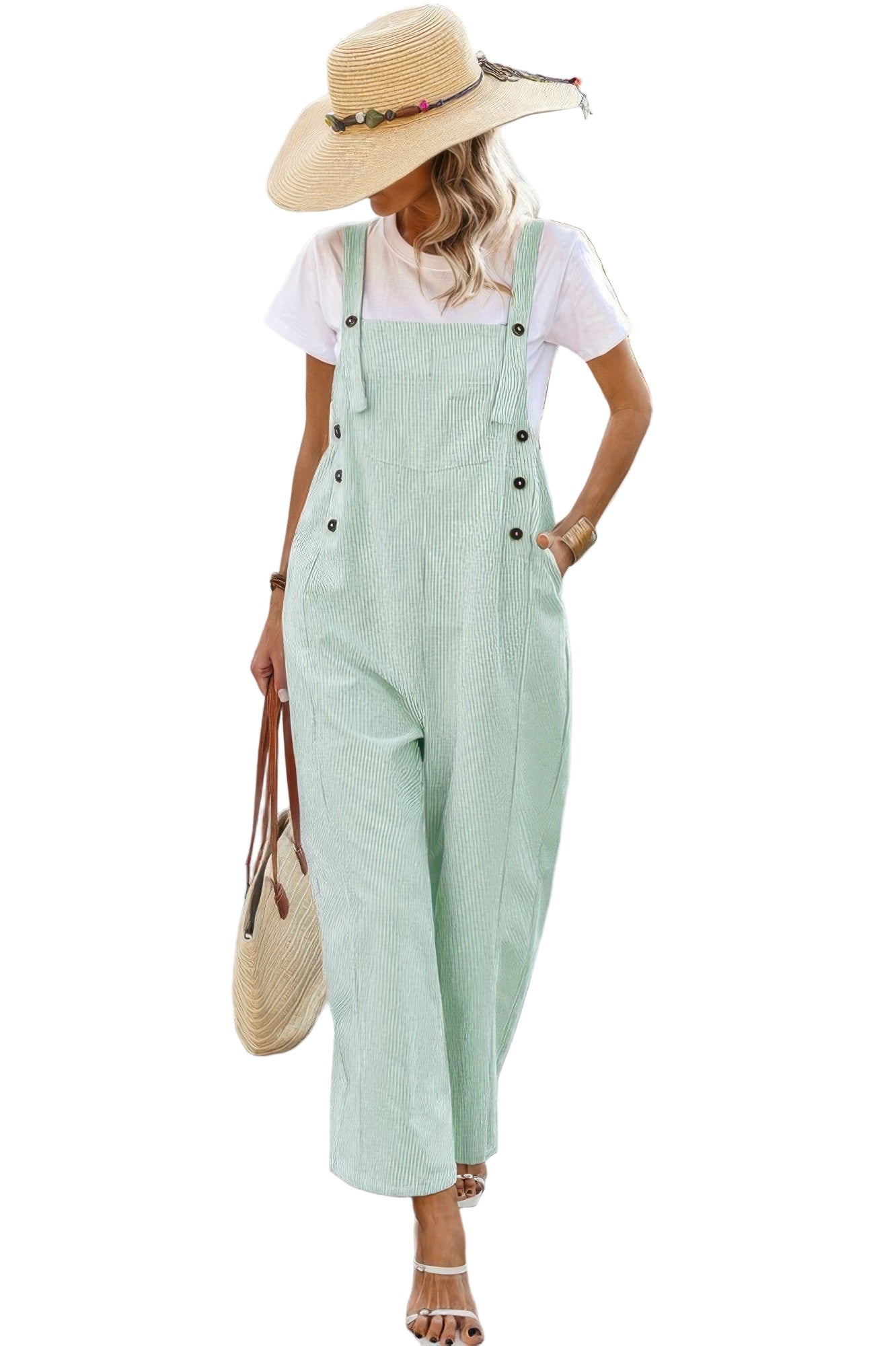 Light green button trim casual jumpsuit with wide legs, paired with a white shirt and straw hat