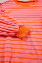 JUNIPER BLVD striped drop shoulder sweatshirt in pink and orange colors with ribbed cuffs