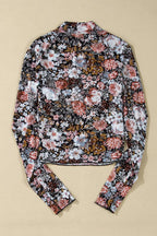 Back view of a JUNIPER BLVD mock neck floral blouse for women with colorful floral patterns.