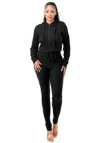 Stylish women's black cable knit hoodie sweater set with matching pants for a chic look