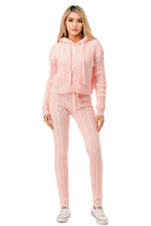 Stylish women's cable knit hoodie sweater set in soft pink, perfect for casual wear