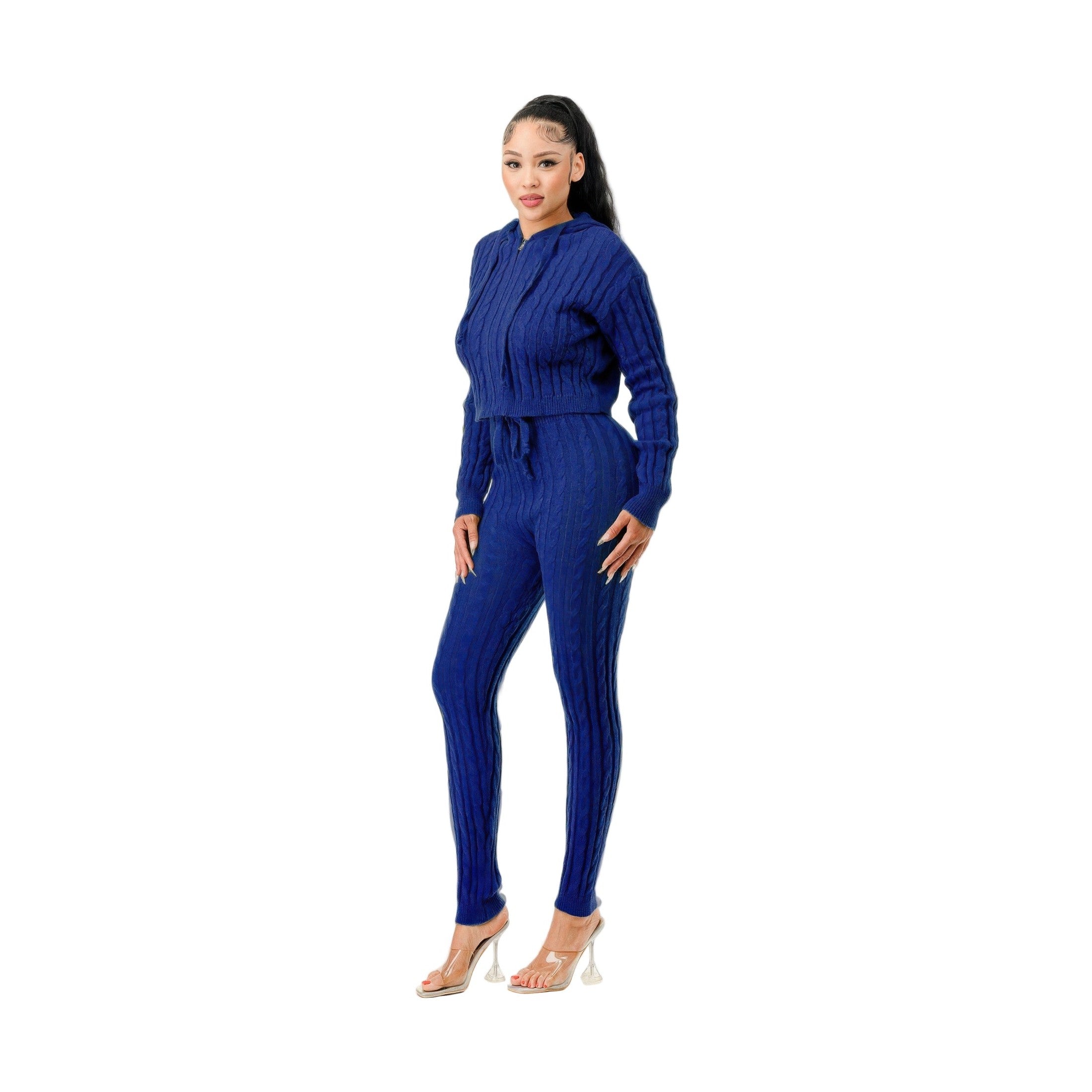 Stylish women's cable knit hoodie sweater set in blue, paired with fitted pants for a cozy look