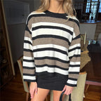 Women's striped cable knit pullover in black and beige for casual outings