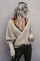 Women's cable knit sweater in beige, perfect for casual wear