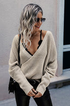 women's cable knit sweater in cream, stylish and casual look