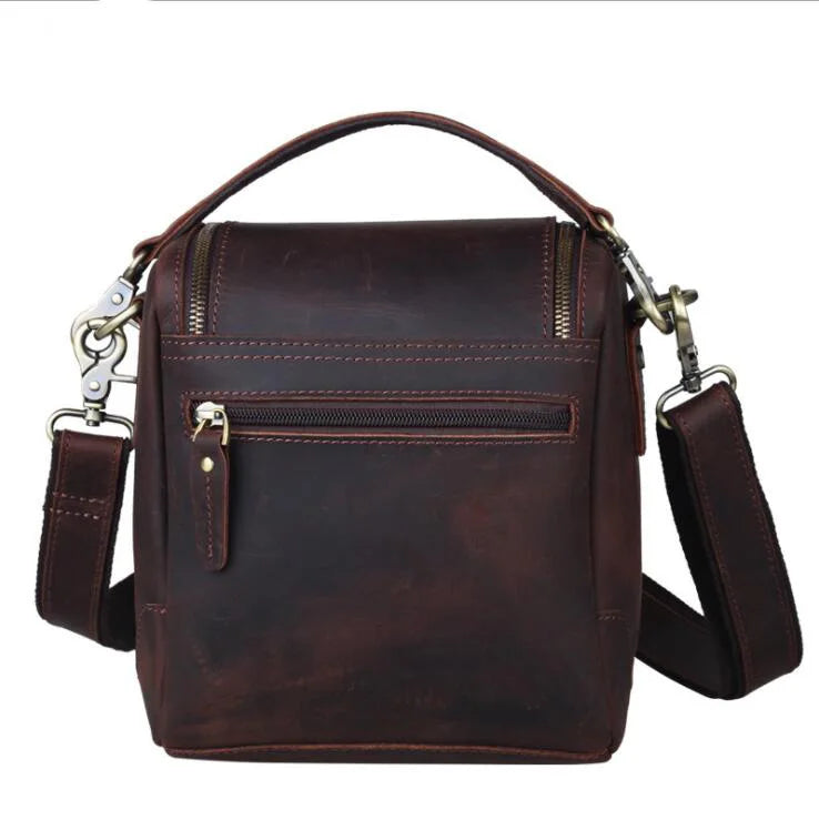 Brown leather camera bag with adjustable strap for photographers