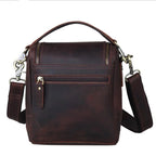 Brown leather camera bag with adjustable strap for photographers