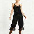 Women's black cami with lace trim, perfect for stylish casual wear