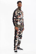 Stylish WEIV camo track pants with stripe for a modern athletic look.