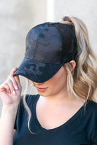Aili's Corner camouflage messy bun cap designed for stylish convenience and comfort