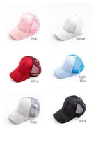 Aili's Corner camouflage messy bun cap in various colors including pink, white, red, light blue, gray, and black