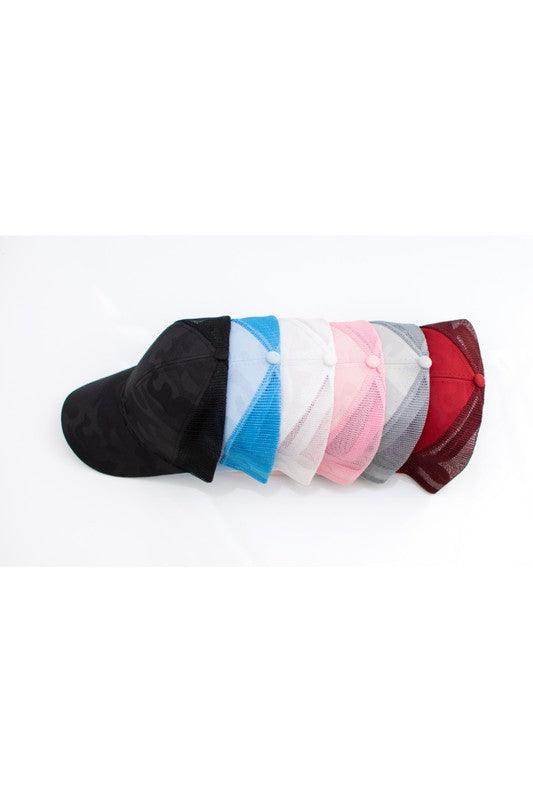 Assorted camouflage messy bun cap in various colors for stylish women